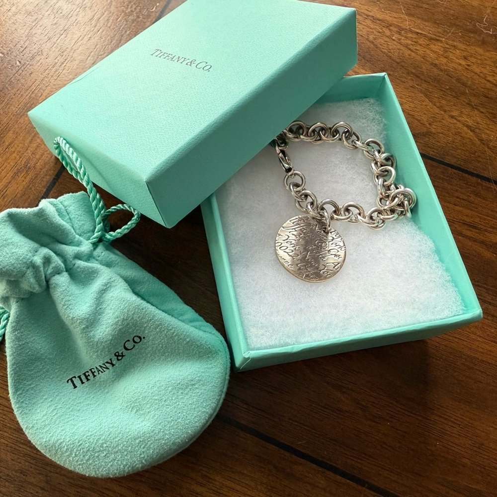Tiffany & Co. - 7.5" Sterling Silver Charm Bracelet, Round Tag Notes Charm